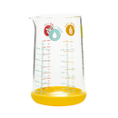 Verre doseur en verre 500 ml avec base anti dérapante en silicone jaune PEBBLY